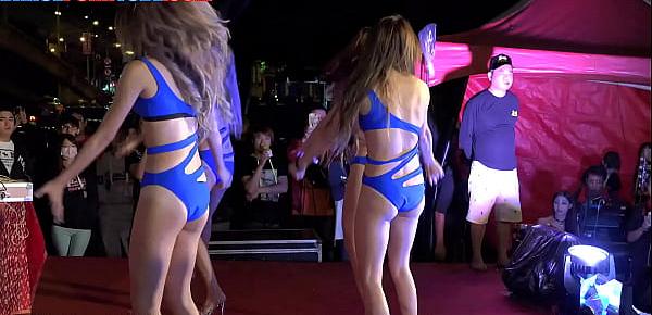  group of asian whores dancing provocatively in swimsuits